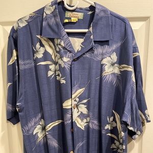 Mens Tommy Bahama size large in dark blue with a floral design